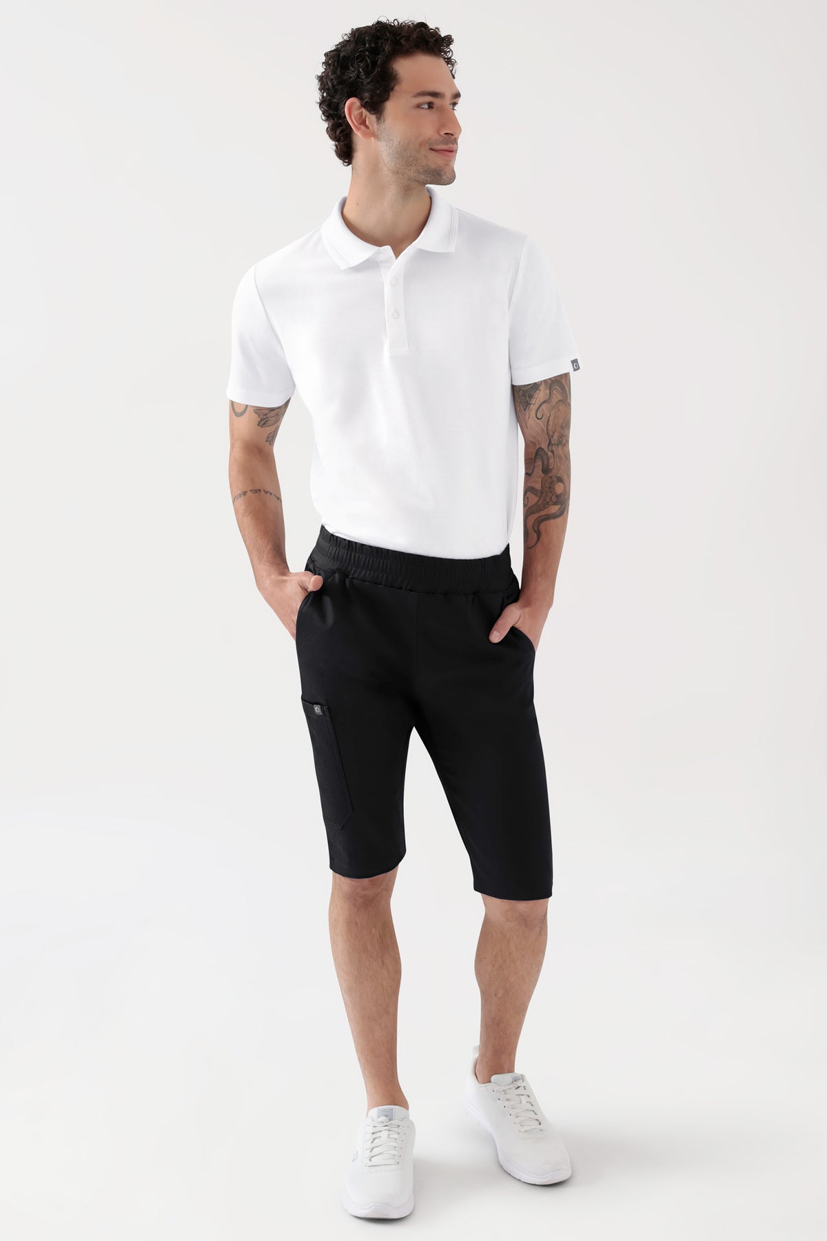COMFY FLEX Stretch Hose Unisex - Bermuda schwarz, Vorderansicht Das Model ist 188 cm groß und trägt Größe M
