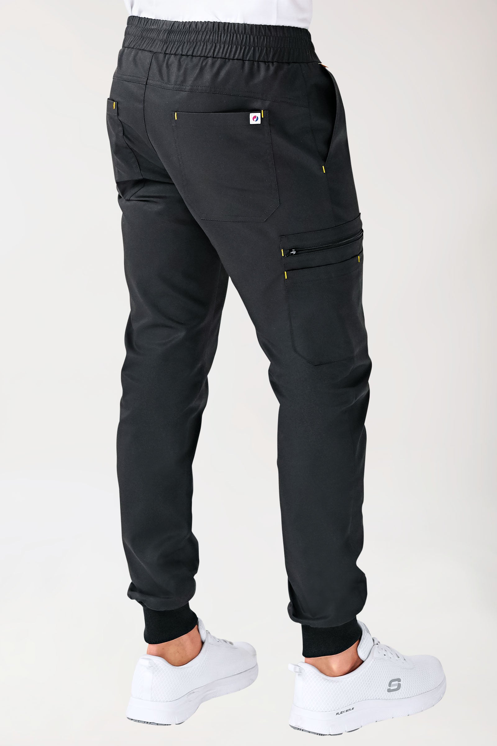 CLINIC STRETCH Hose Herren - Saumbündchen schwarz/gelb, Rückansicht 