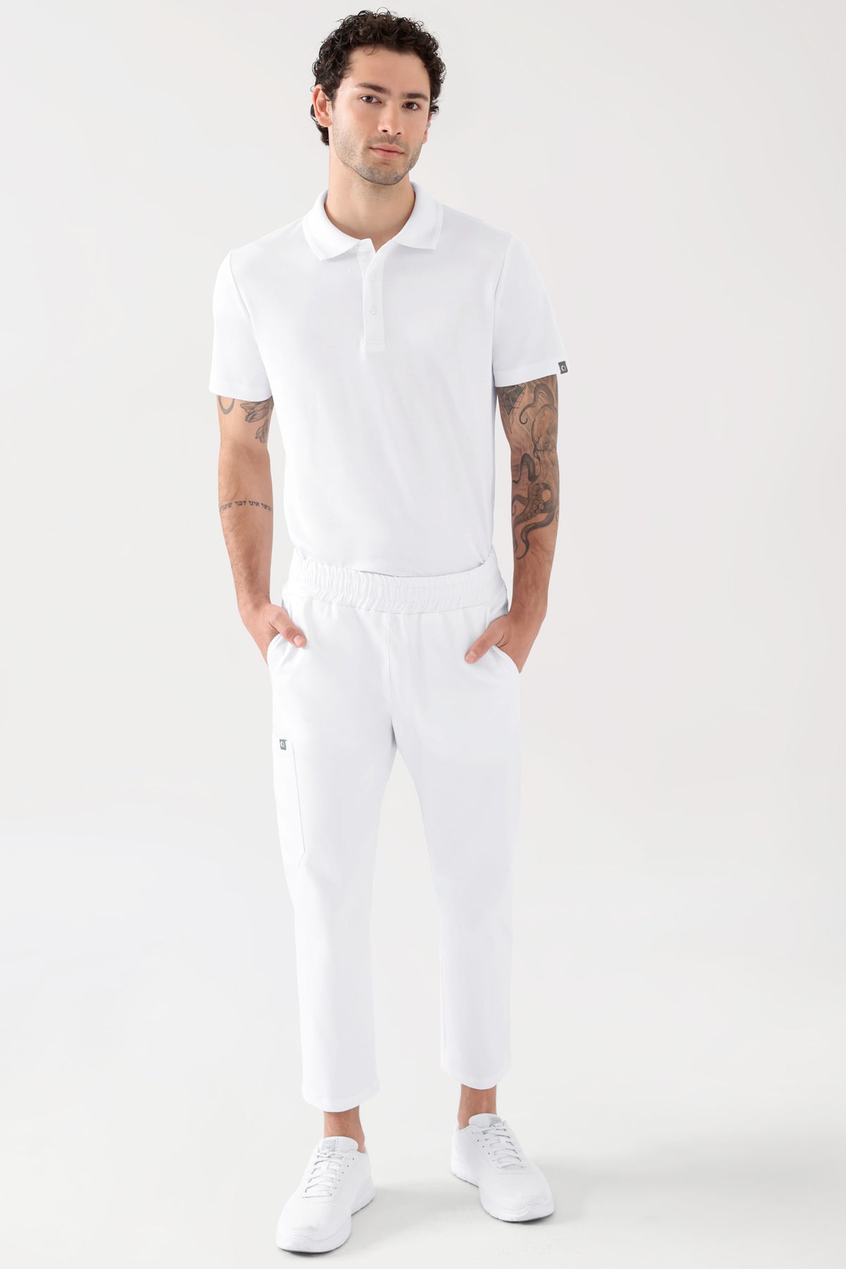 COMFY FLEX Stretch Hose Unisex - 7/8 Länge weiß, Vorderansicht Das Model ist 188 cm groß und trägt Größe M